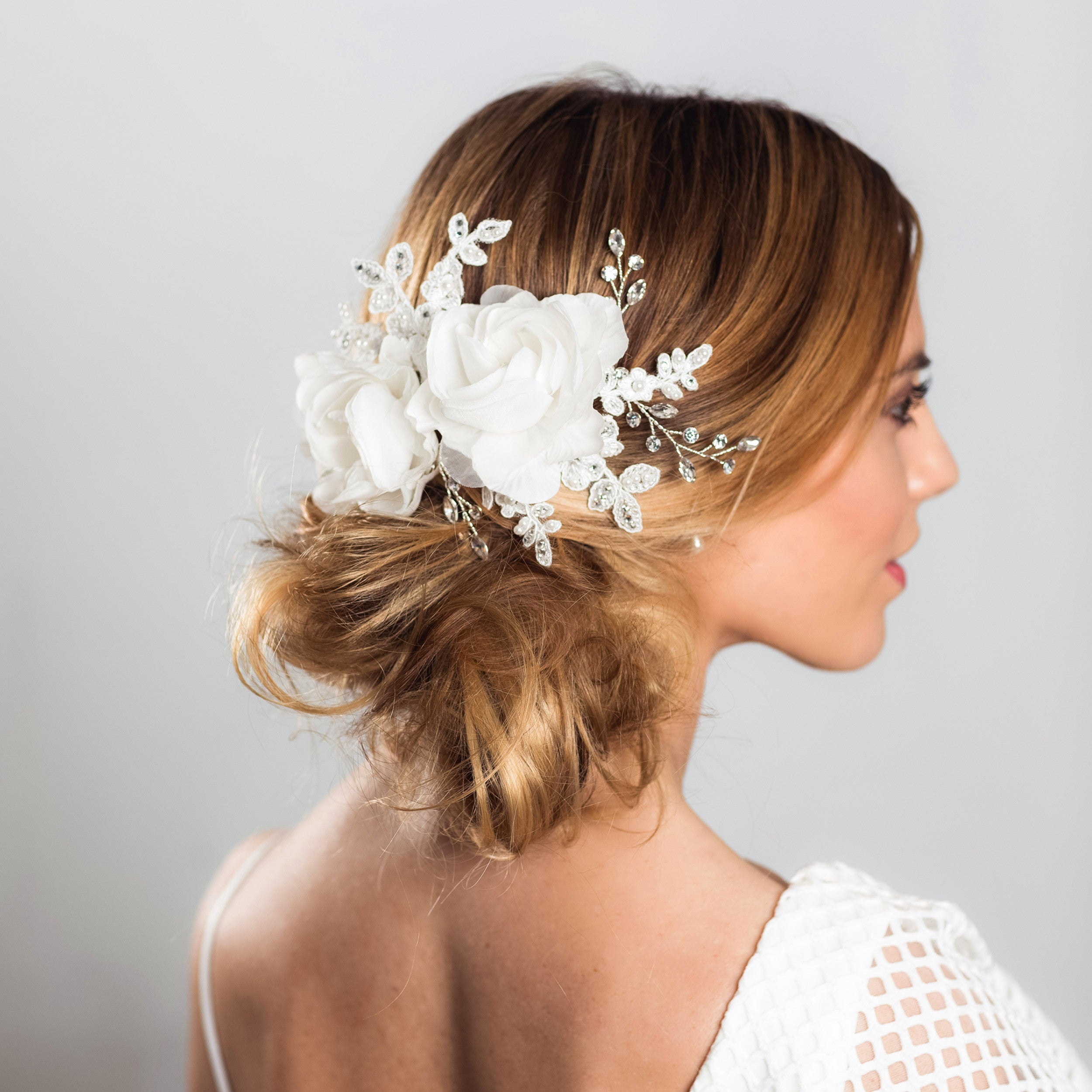 Blossom fabric and crystal hairpiece